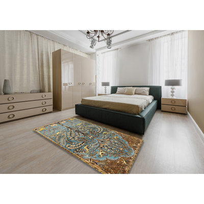 Tapis brun / bleu / jaune Arvide