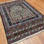 Tapis oriental rouge / vert / ivoire en laine 4 pi 8 po x 6 pi 7 po Oriental