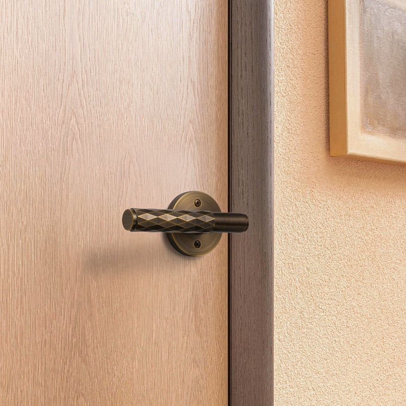 Poignée de porte en laiton à motif de losanges, Bronze