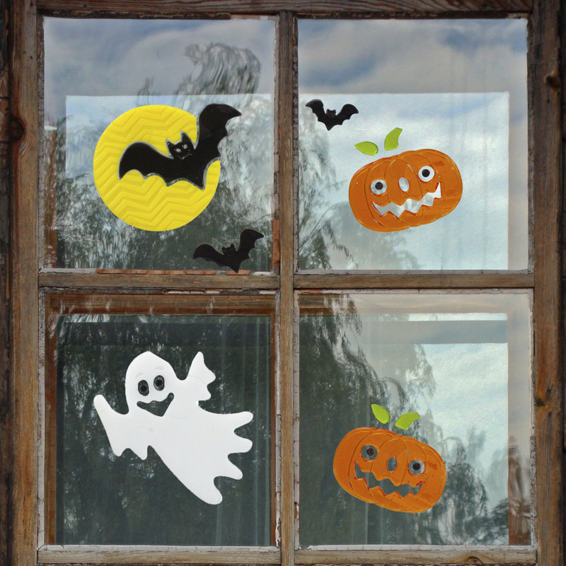 Fenêtre de gel fantôme et citrouille d'Halloween
