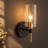  1 - Light Dimmable Black/Brass Armed Sconce-130629970