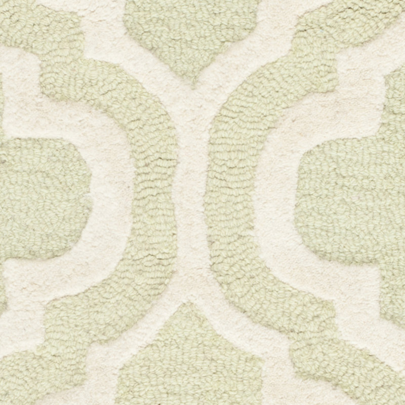 Handmade Light Green and Ivory Tufted Wool Round Rug
