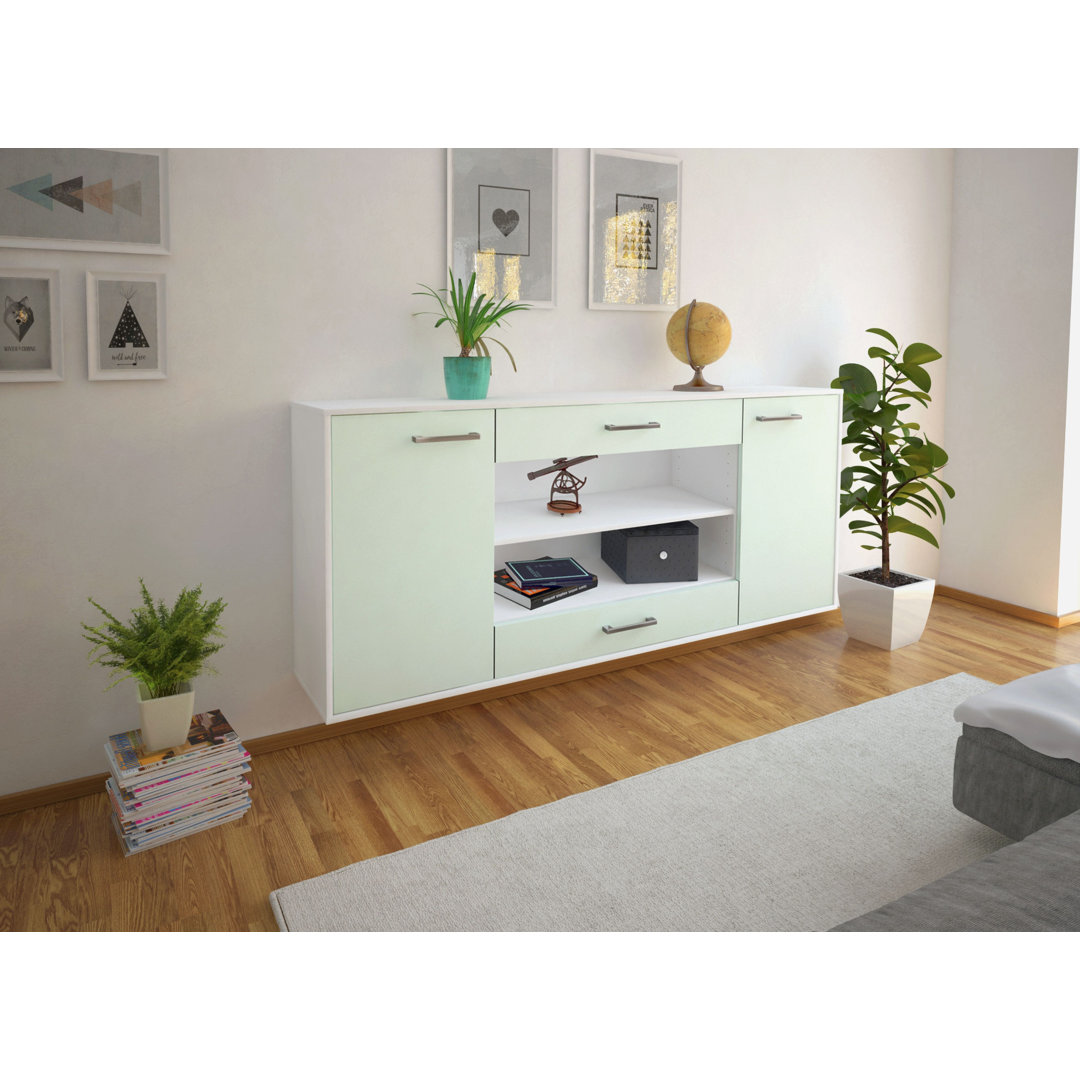 Das Sideboard Mussab hat Metallgriffe. Es hat die Maße 180 cm x 79 cm x 35 cm.