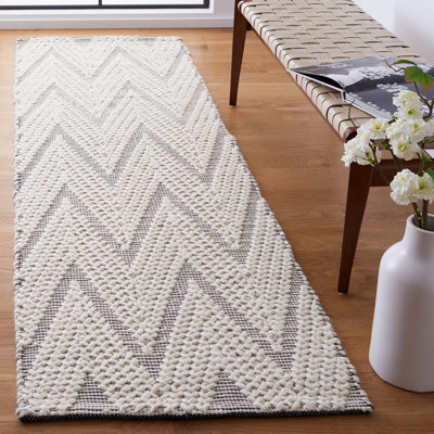 Tapis noir / ivoire en laine et coton à tissage plat Belfort Natura 279