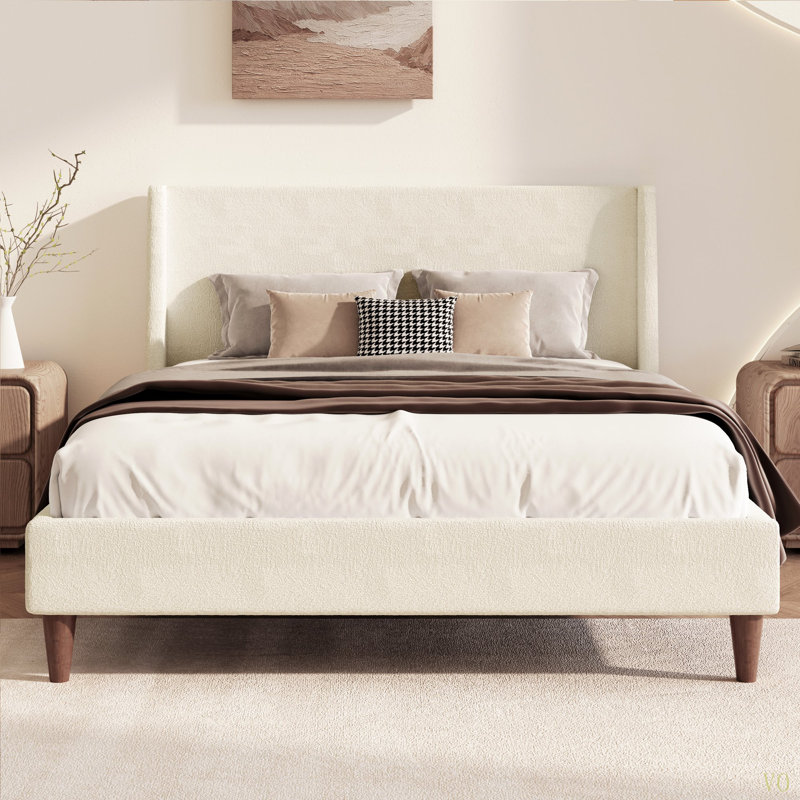 Lit plateforme tapissier moderne avec tête de lit à oreilles et pieds en bois Modern Boucle
