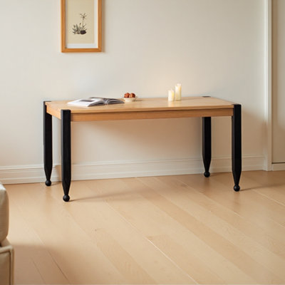 A rectangular solid pine wooden desk