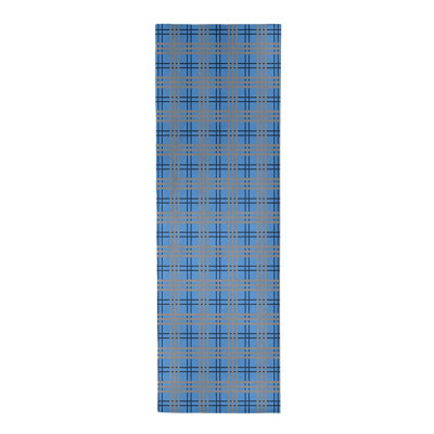 Tapis à carreaux bleu