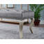 Banc capitonné en tissu avec garniture cloutée