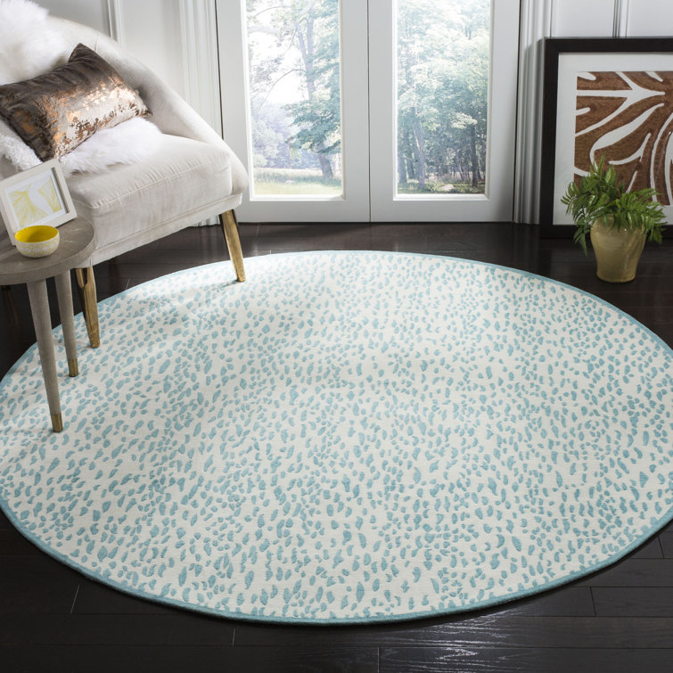 Ankit Hand-Tufted Blue Area Rug