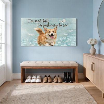 Tableau sur toile tendue représentant un corgi avec un papillon et un champ de pissenlits, idéal pour la décoration du salon, de la chambre ou du bureau.