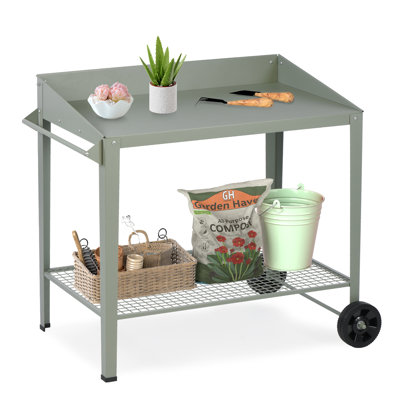Banc de rempotage extérieur en métal avec roulettes et tablette de rangement
