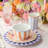 Menagerie 16-Piece Ceramic Dinnerware Set, Service for 4 with Assorted Animal-Themed Dinner Plates, Salad Plates, 3-D Handle Mugs and Ice Cream Bowls in Pastel Circus Colors