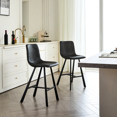 Tabourets de bar ergonomiques en similicuir noir avec une structure en métal et un repose-pieds stable, 2 pour un îlot de cuisine pour une utilisation dans un pub, Structure restaurant