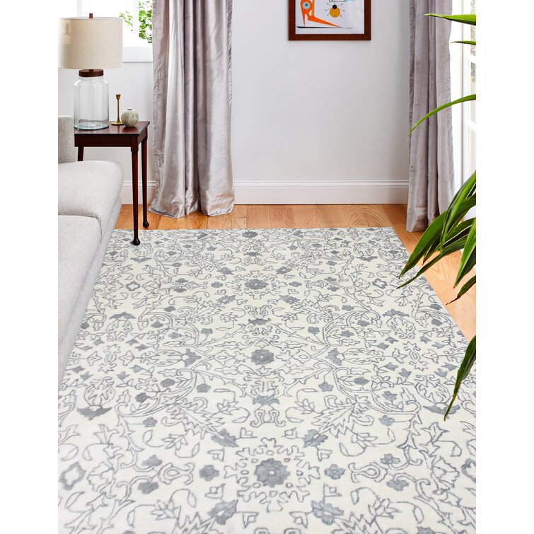 https://assets.wfcdn.com/im/52849596/resize-h755-w755%5Ecompr-r85/7081/70814481/Handmade+Gray%2FWhite+Rug.jpg