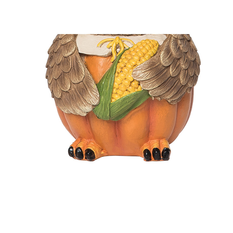 Figurine de hibou avec citrouille