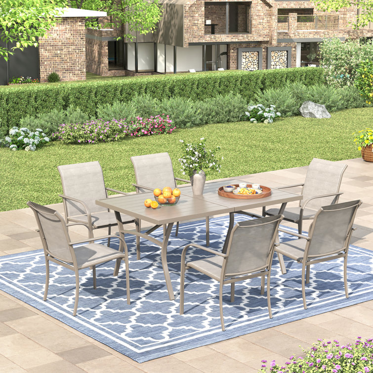 63" Patio Dining Set with Extra Large Rectangular Dining Table and 6 Stackable Armrest Chairs