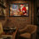 Christmas Santa Claus In Kitchen With Cookies And Fruit