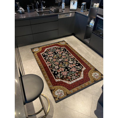 Tapis décoratif beige et rouge à motif multicolore