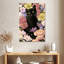 Petit chat noir Brampt dans un jardin coloré-108247875