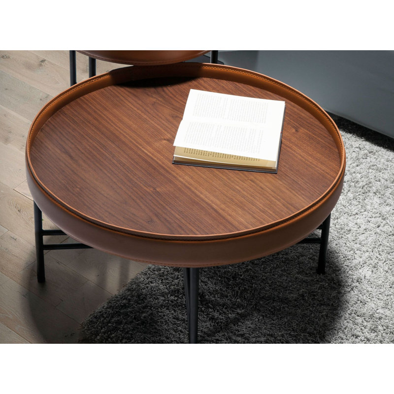 Round coffee table in walnut and black steel