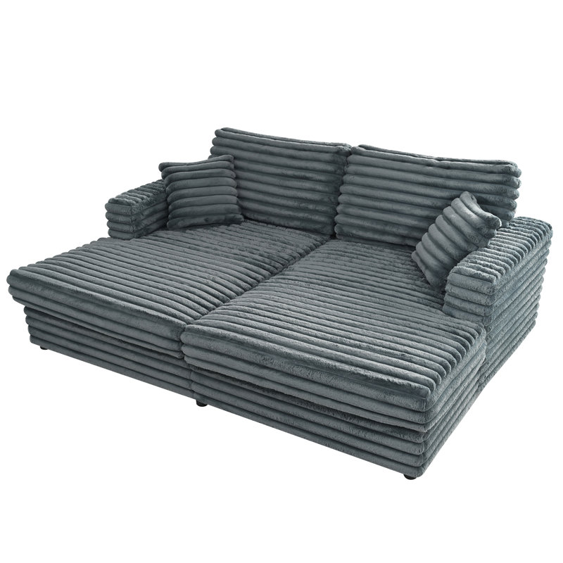 Très grand canapé-lit avec méridienne et coussins décoratifs, velours côtelé moelleux pour une détente confortable dans le salon