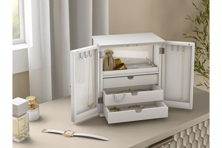 white jewelry and watch box opened to reveal jewels and watches
