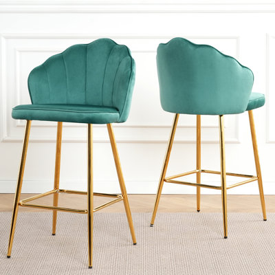 Duo de chaises de bar en velours en forme de coquillage avec pieds en métal doré. Pour le café, le bar et le restaurant. Ergonomique pour réduire la fatigue. Siège éponge épais. Courbe élégante. Base. Coussin de pied réglable. 250 livres