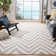 Rodgers Hand Woven Flat Weave Wool/Cotton Chevron Rug in Gray/Ivory