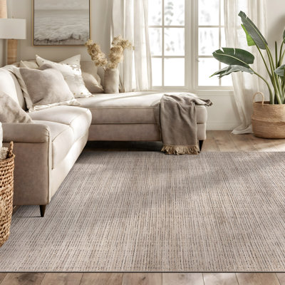 Tapis rayé beige texturé à rayures