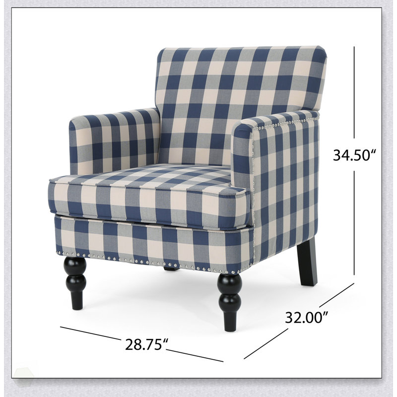 Fauteuil exquis avec des détails ornés et un design capitonné confortable pour des intérieurs élégants