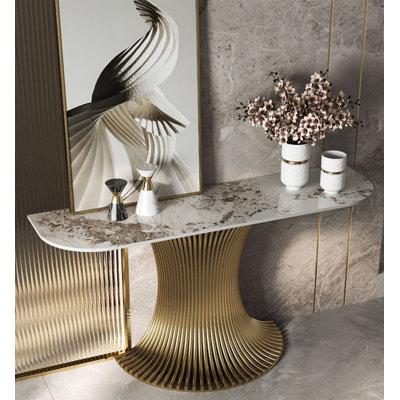 Console murale contemporaine à bord arrondi avec plateau en pierre veinée et caisson vertical en forme de sablier