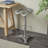 Cole And Grey Metal Weathered Antique Cast Iron Scroll Bar Stool With Cutout Textured Seat And Footrest
