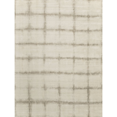 Chroma Geometric Area Rug in Ivory/Silver