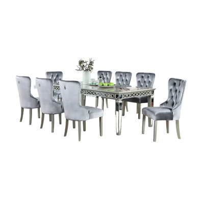 Salle à manger extensible argent et gris foncé avec table rectangulaire, chaises à oreilles avec boutons en acrylique, tablier miroir à garniture cloutée de couleur grise, feuille décorative de 18 pouces, table d'appoint