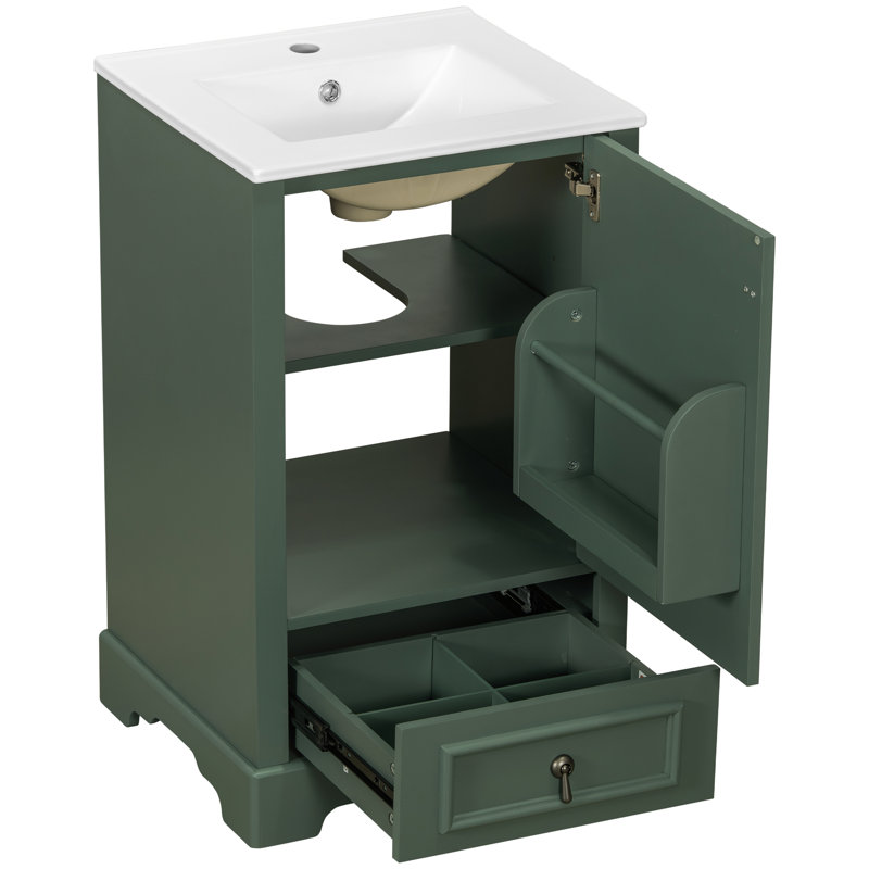 Meuble-lavabo de 50 cm pour petites salles de bain, avec lavabo en céramique, rangement astucieux et charnières à fermeture douce pour une utilisation silencieuse. Compact avec structure en bois massif, lavabo et système d'organisation.