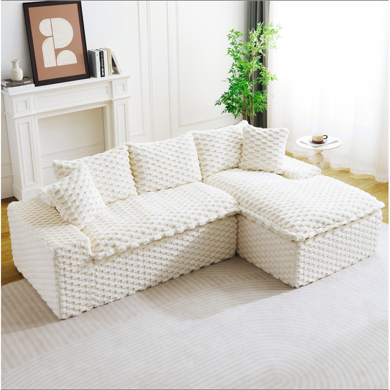 Canapé polyvalent Turtle Velvet : convertible deux places avec méridienne à droite (coussin inclinable pour un confort optimal), configuration face à face, transformable en L ou en ligne droite.