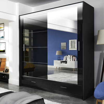 Keneisha 2 Door Solid + Manufactured Wood Wardrobe