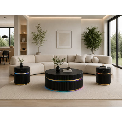  Ensemble de table de salon intelligent 3 pièces Detweiler Illuminaire avec table basse ronde de 39,37 po et deux tables de bout de 19,49 po, charge sans fil, éclairage à DEL et détails dorés nervurés à finition noire