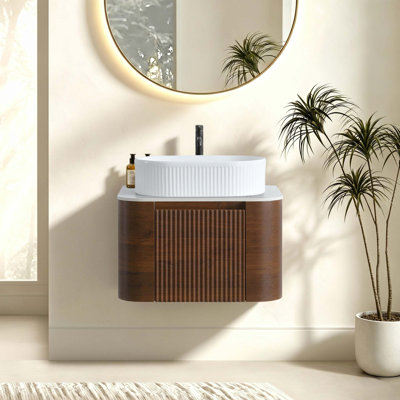 Meuble-lavabo courbé et cannelé avec lavabo ovale en céramique et porte-serviettes assorti