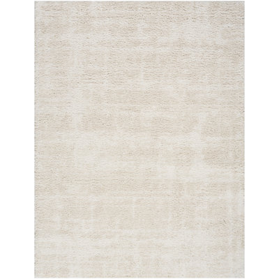 Tapis d'intérieur moderne ivoire Ebold Ebern Designs