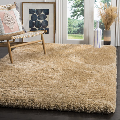 Gilcrease Shag Hand-Tufted Beige Area Rug