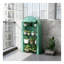 Serre compacte portable avec quatre tablettes et housse de protection en plastique