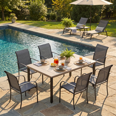 Leyre 6 - Person Patio Dining Set with Rectangular Table and 6 Stackable Dining Chairs