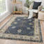 Tapis oriental bleu foncé en laine noué à la main Mccombs-1574758137