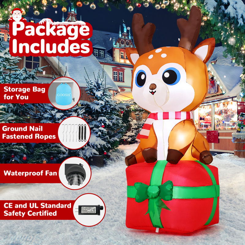 Renne de Noël gonflable de 6 pi assis sur une boîte-cadeau avec DEL intégrées
