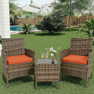3-Piece Outdoor Rattan Bistro Set with Tempered Glass Table and 2 Cushioned Chairs for Patio, Balcony, or Poolside