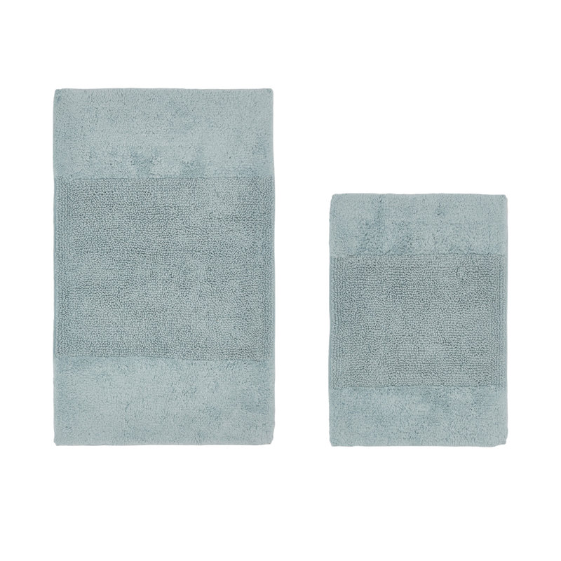 Ensemble de tapis pour salle de bain 2 pièces 100% coton 2155 g / m² Makaylynn, certifié OEKO-TEX®, envers en latex antidérapant, touffeté moelleux, super absorbant, tapis de salle de bain lavables à la machine, bleu