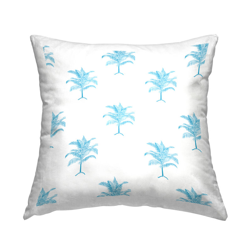 Coussin bleu à motif de palmiers imprimés par Amelia Noyes