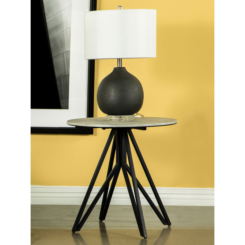 Table de bout ronde en ciment et bronze industriel Hadi