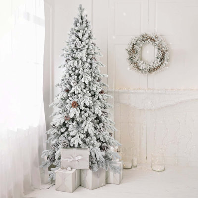Arbre de Noël floqué à charnières en PE / PVC avec pommes de pin naturelles et support en métal stable